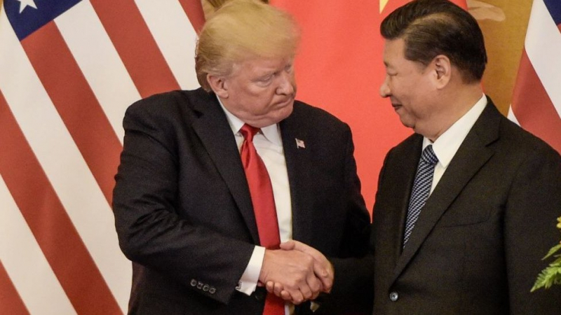 Trump bans U.S. investments in firms linked to Chinese military