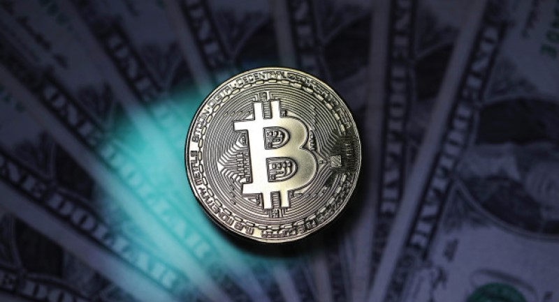 Bitcoin’s market value tops $1 trillion